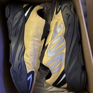 Yeezy Black and Gold Sneakers